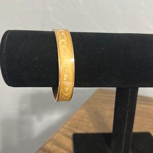 HP! 🎉💃 Monet vintage yellow enamel swirl bangle bracelet. Measures 2 1/2”.